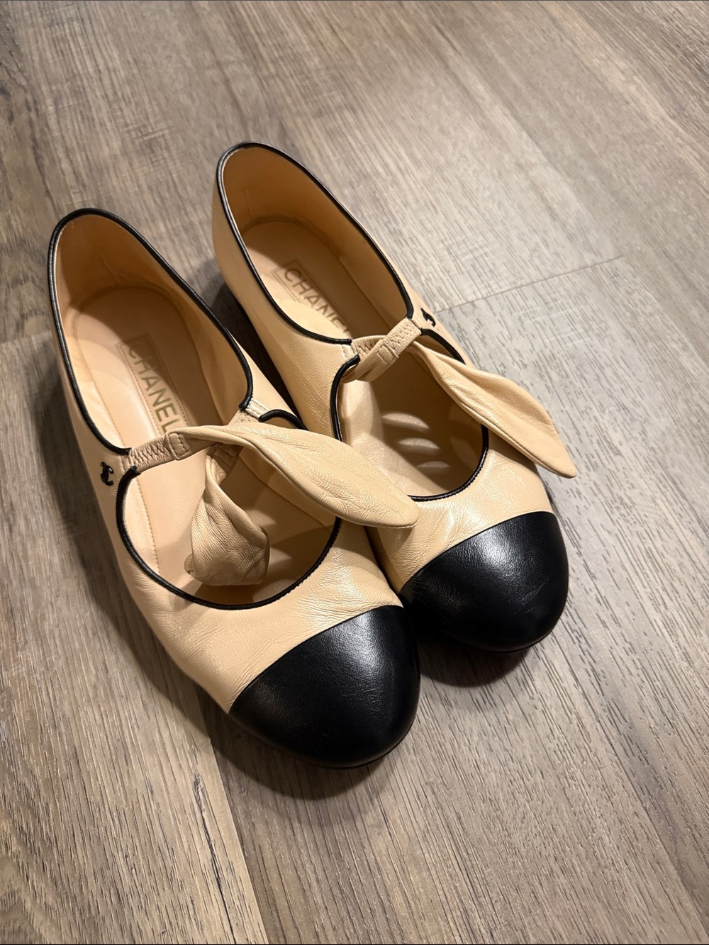 CHANEL Beige and Black Leather Mary Jane Bow Flats